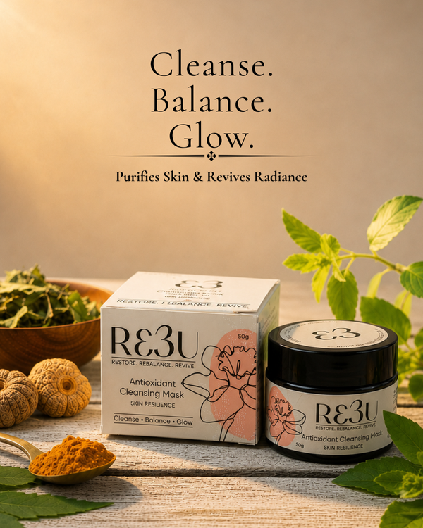 RE3U Cleansing Mask jar and box displayed on a rustic wooden surface with herbal ingredients and leaves around it. Large text at the top reads 'Cleanse.