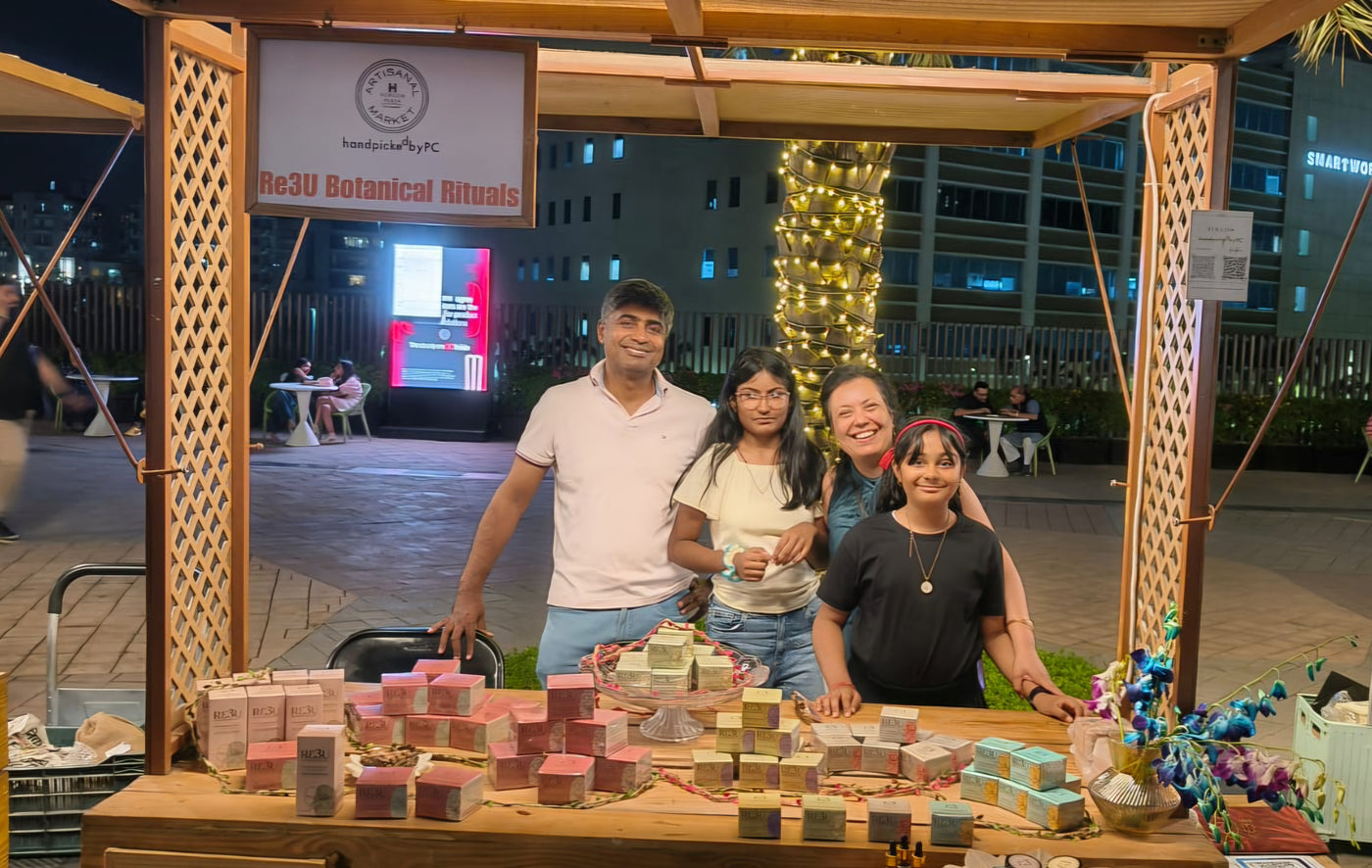 Jigisha with her family at a Re3U market stall