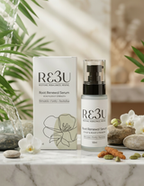 RE3U Root Renewal Serum bottle and packaging on a marble surface with plants in the background thumbnail 2