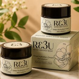 Three jars of RE3U Retinol Serum Cream arranged on top of and beside its product box, with a soft beige background and blurred green leaves in the corner.